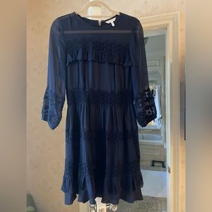 Navy dress with sheer sleeves